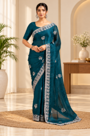 Sophisticated Teal Georgette Saree with Silver Floral Motifs & Lace-Inspired Embroidered Border.
